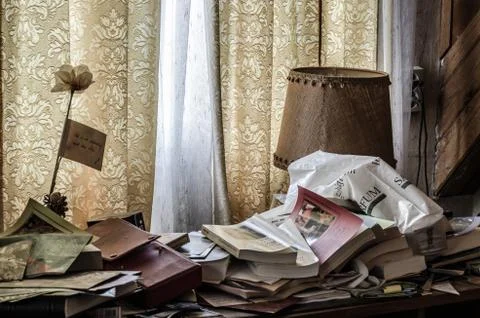 Old objects at window in abandoned house Stock Photos