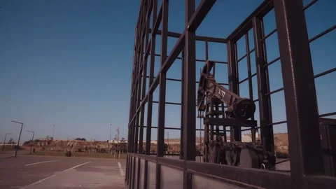 The old oil rig is working, extracting oil.pumping unit and the silhouette .. Stock Footage 232606225