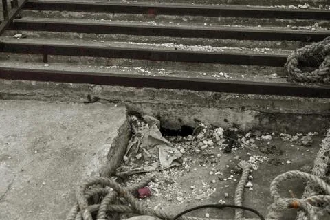 An old open outer stone staircase. Stone, cement steps of the old staircase w Stock Photos