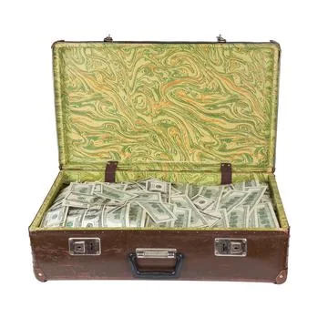 Old opened brown suitcase full of hundred dollar banknotes isolated on white Stock Photos