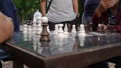 Old opponent attacking in chess in Kalemegdan Park of Belgrade slow pan left Stock Footage 93261585