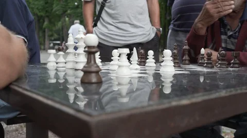 Old opponent attacking in chess in Kalemegdan Park of Belgrade slow pan left Stock Footage 93261599