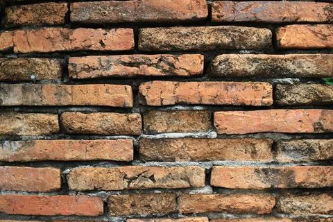 Old orange block brick wall backgrounds textures. Stock Photos