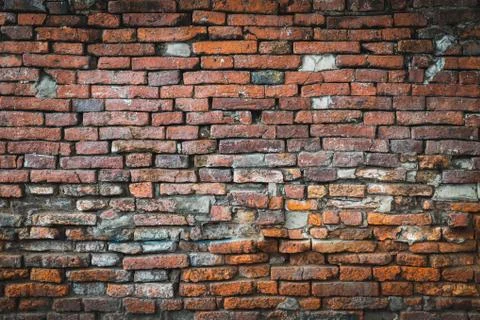 Old orange brick wall background Stock Photos