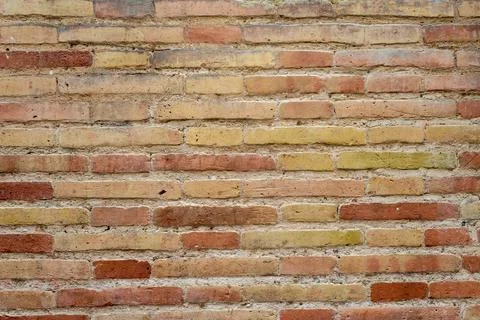 Old orange brick wall background texture in high resolution Stock Photos