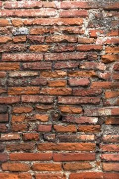 Old orange brick wall, close up. Stock Photos