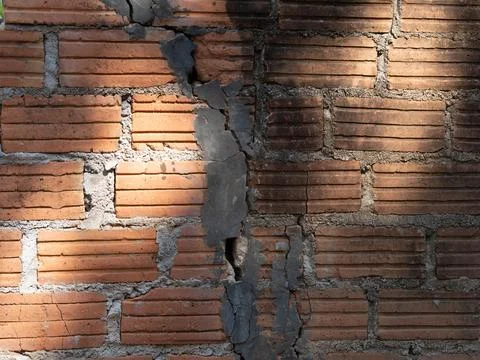 Old orange bricks and broken cement walls. Foto stock