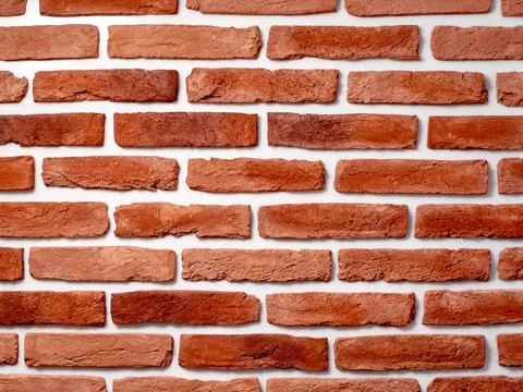 Old orange bricks Stock Photos