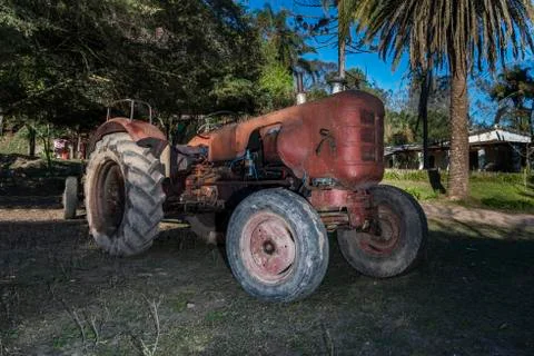 Old orange tractor Foto stock