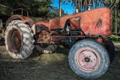 Old orange tractor Stock Photos