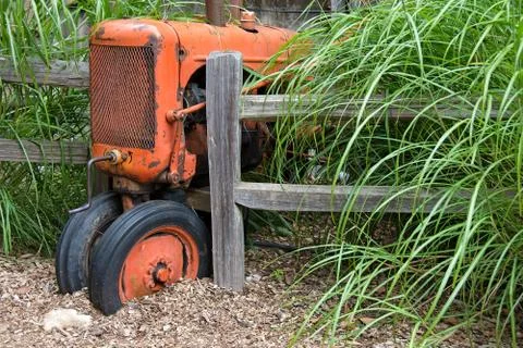 Old orange tractor Stock Photos
