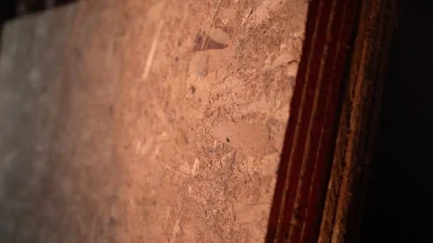 Old oriented strand boards in a warehouse, close-up. Stock Footage 244763386