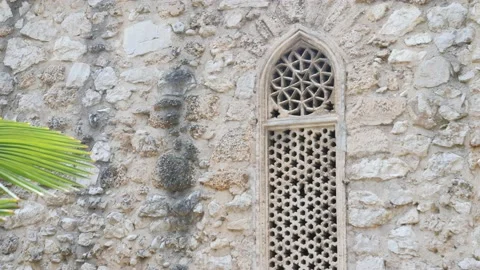Old Ornate Mosque Window and Rock Exterior, Close Up Video stock 229886114