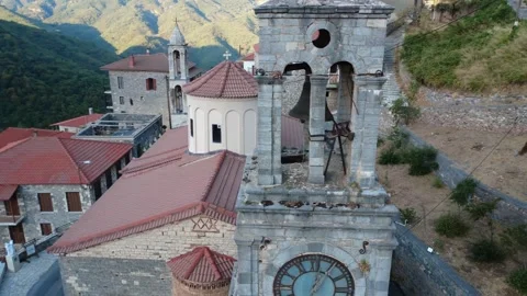 Old Orthodox Bell Tower With Dramatic Mountain and Ravine Views Greece Stock Footage 324867614