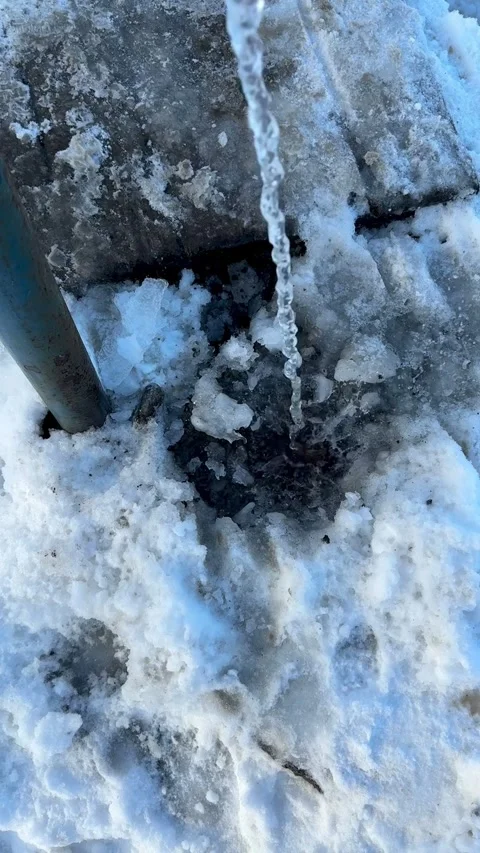 An old outdoor drinking pump is a water pump for filling water tanks outdoors in Stock Footage 316430131