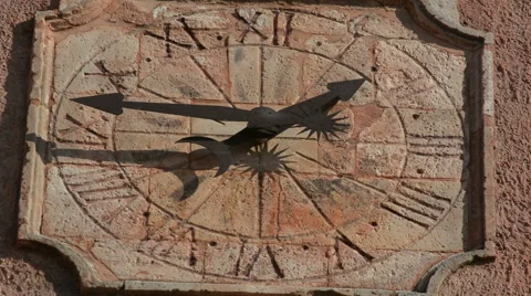 Old outdoor wall clock with moving hand clockwise, Roussillon, France Stock Footage 66290801