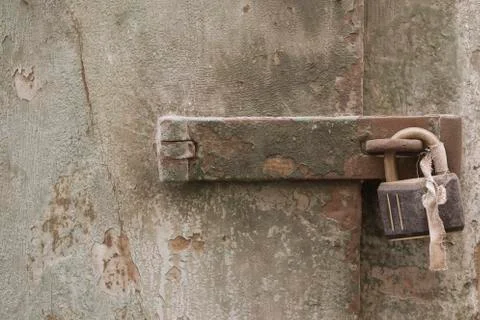 Old padlock on door Stock Photos