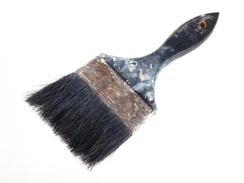 Old paint brush on a white background. Stock Photos