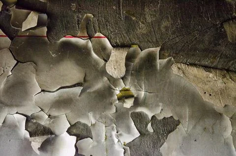 Old paint on the wall, burned after a fire Stock Photos