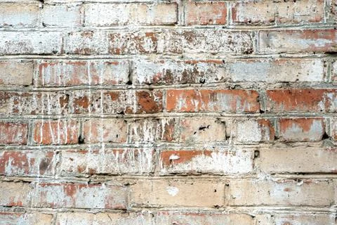 Old painted brick wall background. Brick wall texture Stock Photos