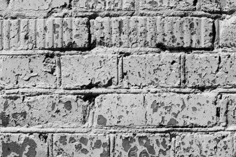 Old painted brick wall close up. Monochrome abstract background Stock Photos