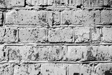 Old painted brick wall close up. Monochrome abstract background Stock Photos