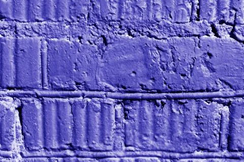 Old painted brick wall close-up. Brick wall background blue color toned Foto stock