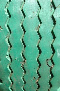 Old painted tyre tread bar close up Stock Photos