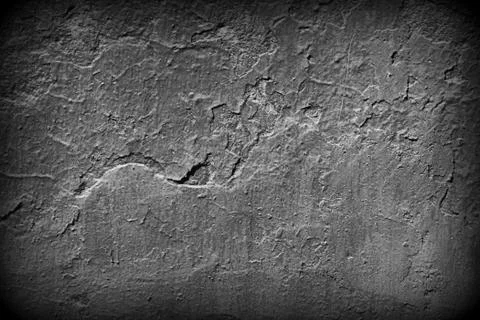 Old painted wall texture close up. Monochrome abstract background Stock Photos