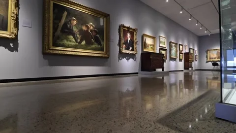 Old Paintings in empty Art Gallery - Side to side shot Stock Footage 169866404