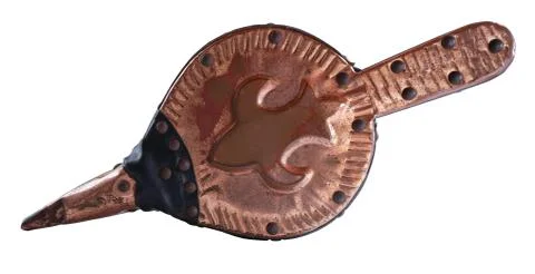 Old pair of leather and copper bellows with fleur de lis embossed, isolated on Stock Photos