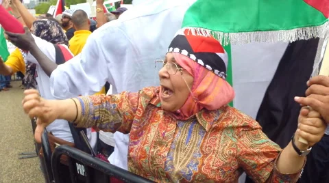 Old Palestinian lady protests against Israeli Jews Stock Footage 40633241