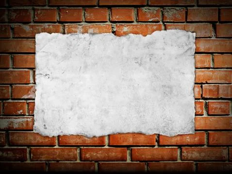 Old paper on brickwall Stock Photos