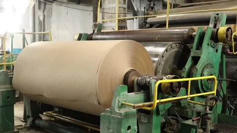 An old paper mill at the end of the conveyor for the production of technical Stock Footage 234208893
