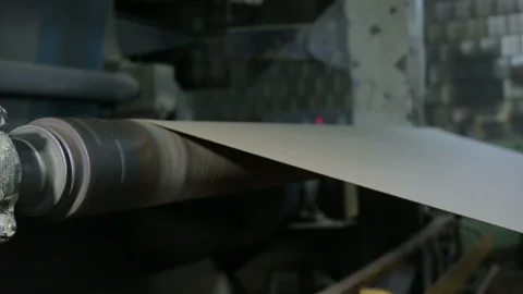 The old paper mill roll on the conveyor, the slider Stock Footage 91228332
