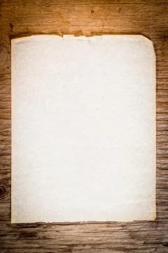 Old paper on old table Stock Photos