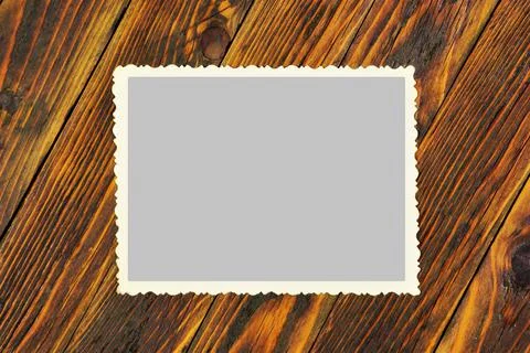 An old paper photo with patterned edges. Stock Photos
