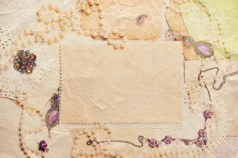 Old paper sheets surrounded by retro women's accessories Stock Photos