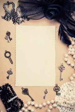 Old paper sheets surrounded by retro women's accessories Stock Photos