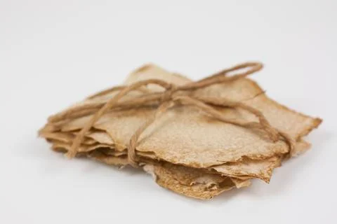 Old paper tied with string Stock Photos