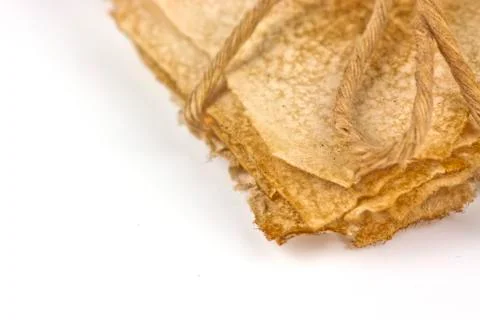 Old paper tied with string Stock Photos