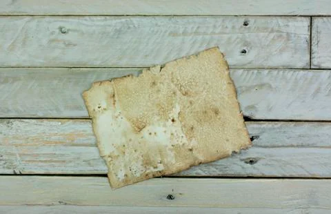 Old paper on wooden planks Stock Photos