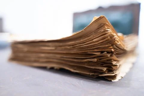Old papers, stacks of old papers on the desk Stock Photos
