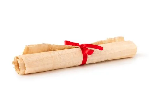 Old papyrus scroll in roll with ribbon isolated on white Stock-Fotos