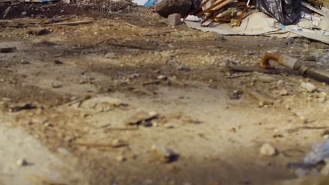 An old partially buried garbage dump. Stock Footage 90182725