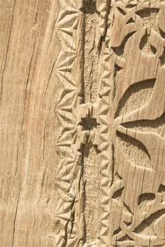 Old pattern of wood frame carve flower on wooden background Stock Photos