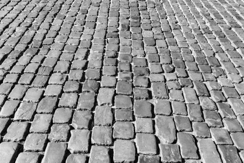 Old pavement of granite texture. Stock Photos