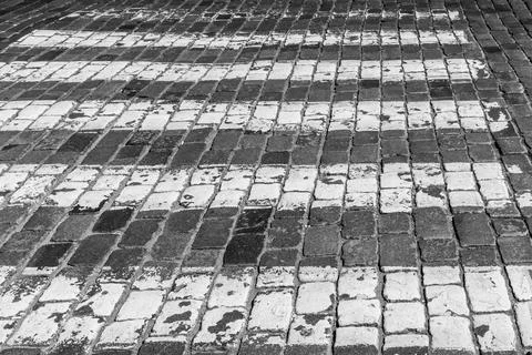 Old pavement of granite texture. Stock Photos