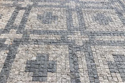 Old pavement of granite texture. Stock Photos