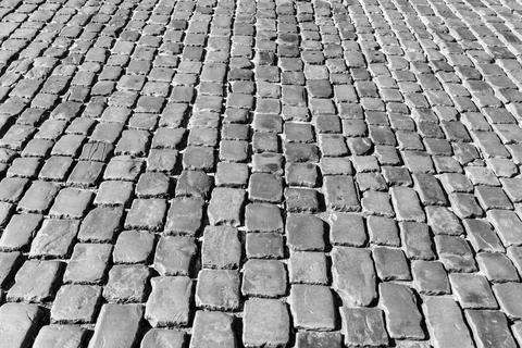 Old pavement of granite texture. Stock Photos